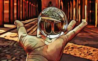 Hand holding a crystal ball in warm setting.